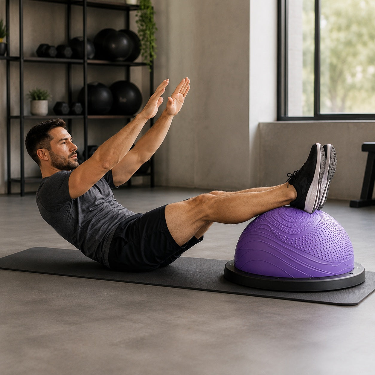 Ballon de gym demi sphère une personne en position de renforcement abdominale
