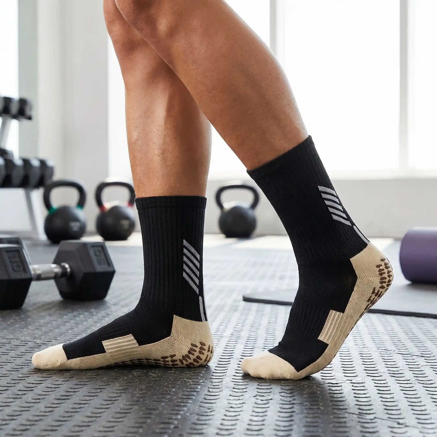 Chaussette antidérapante porté par une personne en salle muscu