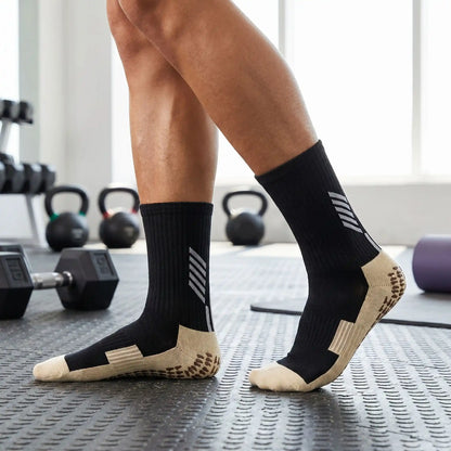 Chaussette antidérapante porté par une personne en salle muscu