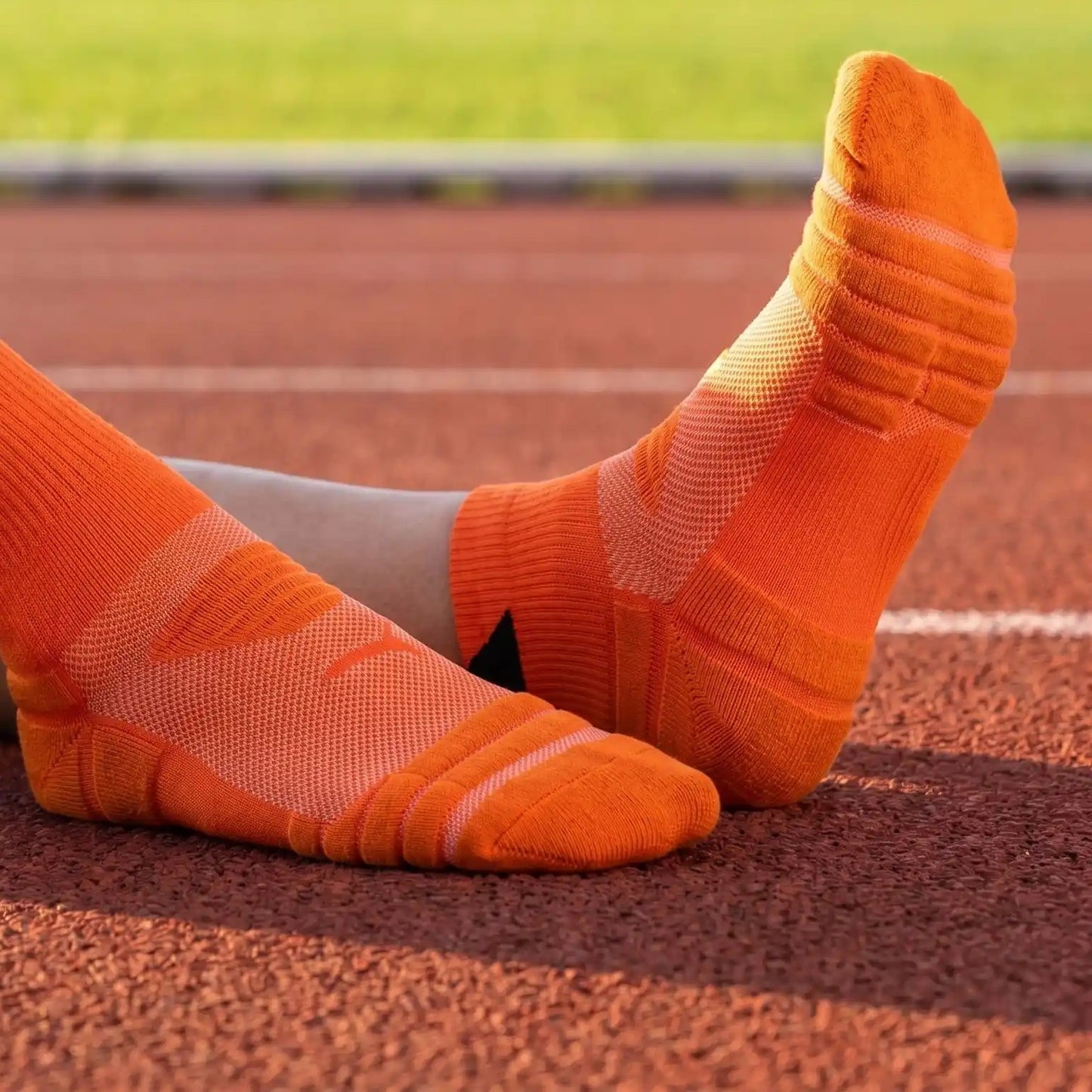 Chaussettes de sport porté sur terrain de sport extérieur