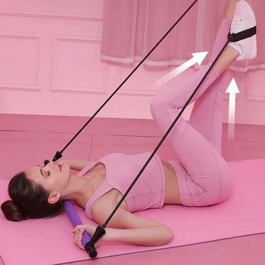 femme elastique musculation avec barre coucher