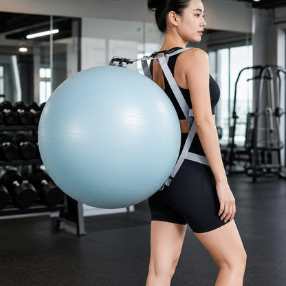Gros ballon de gym avec sangles intégrées porter par une personne au gym 