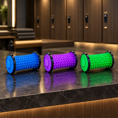 Rouleau de massage pied les trois modèles de couleurs placé sur une personne assis sur un banc d'exercice